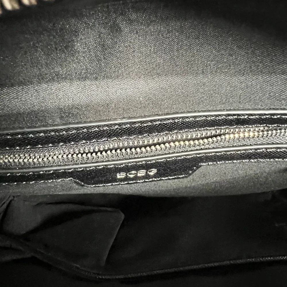 RICARDO Beverly Hills Tan and Black Travel Bag with Structured Shape